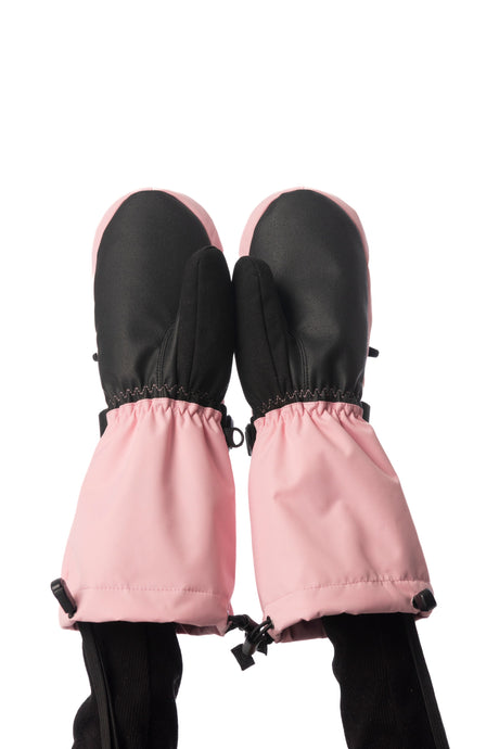 Child wearing Deux par Deux Teknik kids' mittens in light pink, palm side