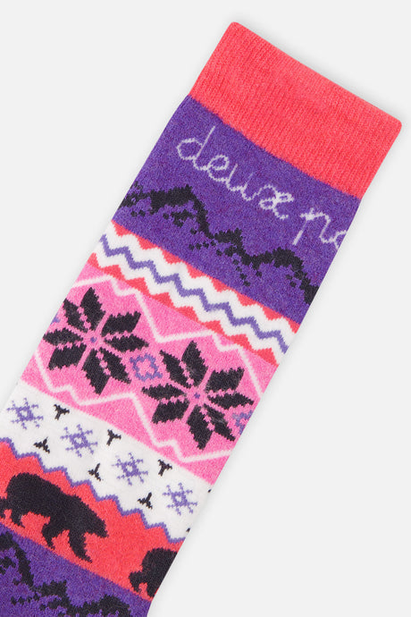 Close-up of a ski sock with snowflake and bear bands below a coral cuff