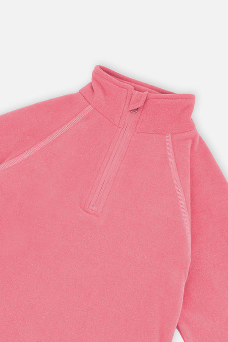 Close-up of the half-zip mock neck and raglan seams on the pink thermal underwear top