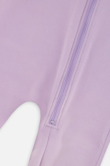 Close-up of the lavender zipper and brushed fabric on the baby one-piece