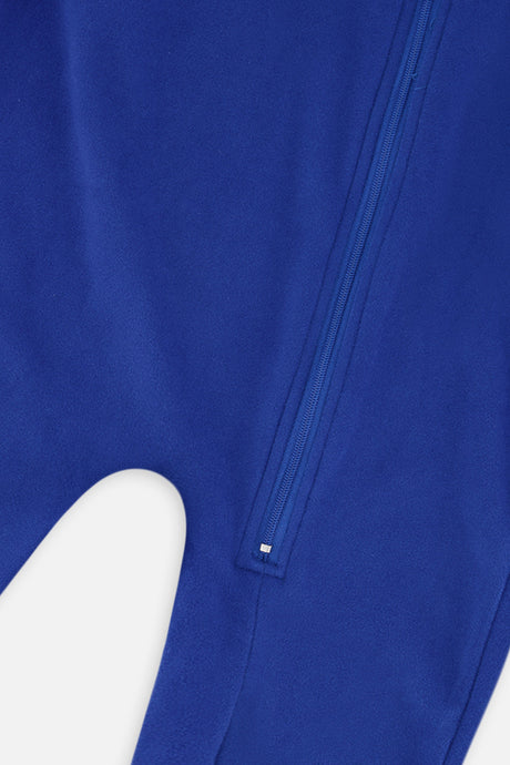Close-up of the royal blue zipper running down to the leg of the one-piece thermal underwear