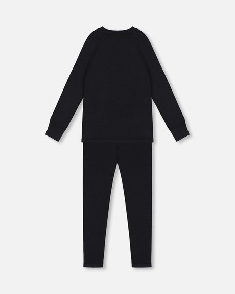 Black boys merino blend two-piece base layer set from Deux par Deux, crew-neck top and pants laid flat, back view