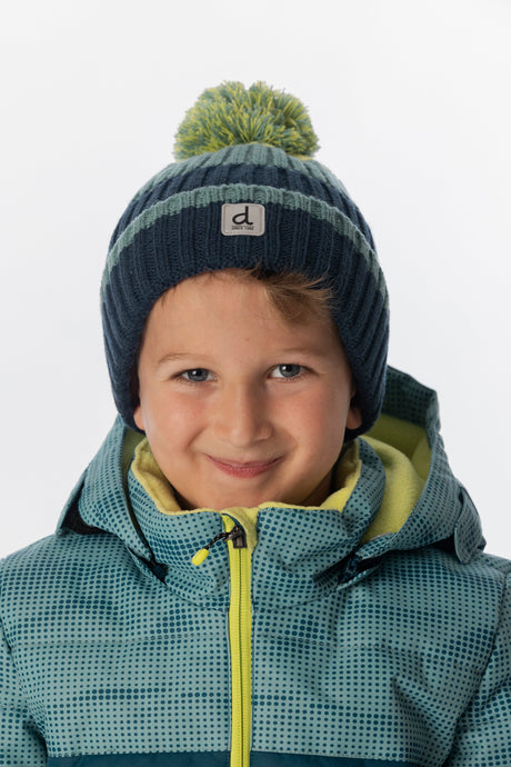 Deux par Deux kids' knit pompom hat, dark turquoise colour-block jacquard – worn by a child