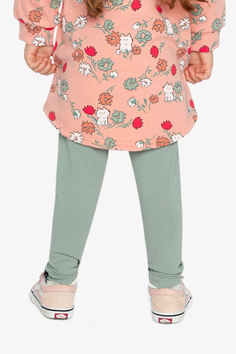 Child wearing the Deux par Deux sage green leggings, back view
