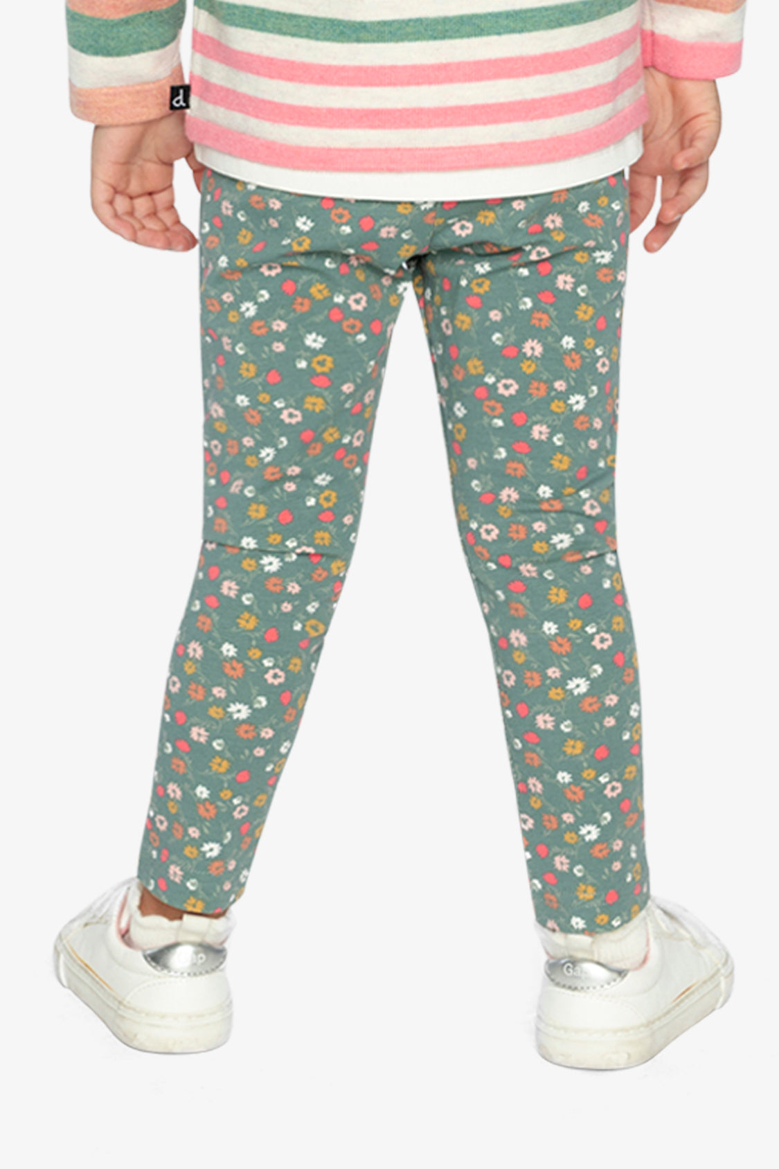 Child wearing sage green floral leggings, back view