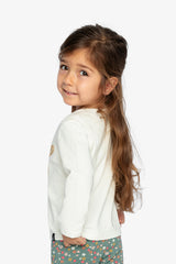 Child looking over the shoulder in the off-white long sleeve tee, back and side view
