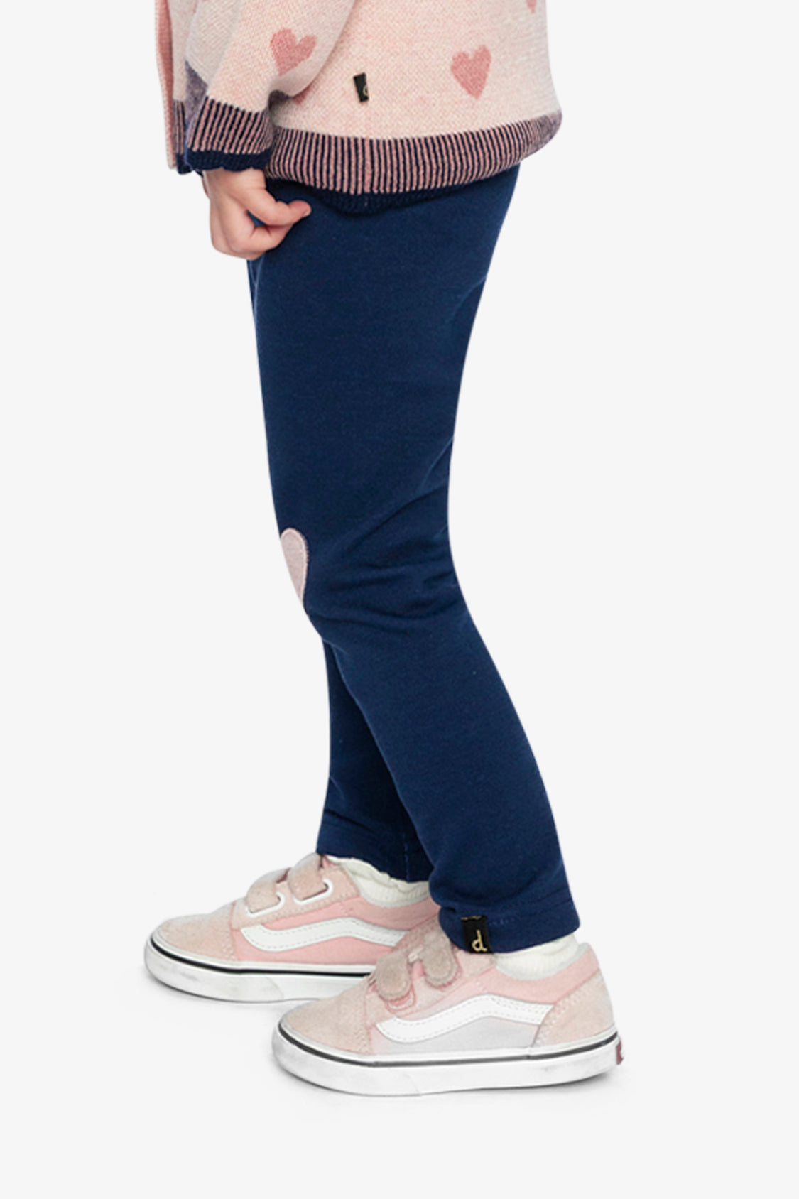 Child wearing the Deux par Deux navy blue leggings, side view