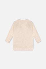 Back view of the beige tunic with long raglan sleeves, laid flat