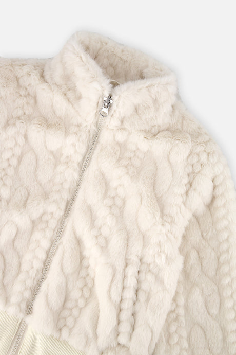 Close-up of the cable-like faux fur texture and the zipper on the cream Deux par Deux jacket