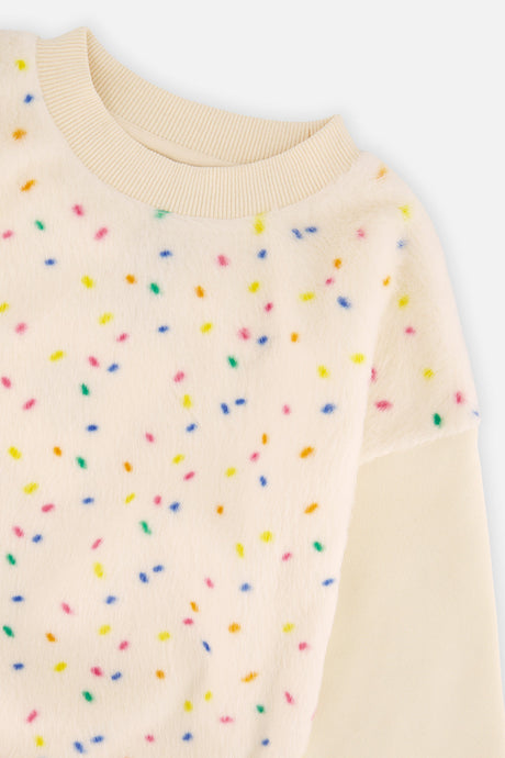 Close-up of the multicolor confetti faux fur panel on the Deux par Deux off-white sweatshirt