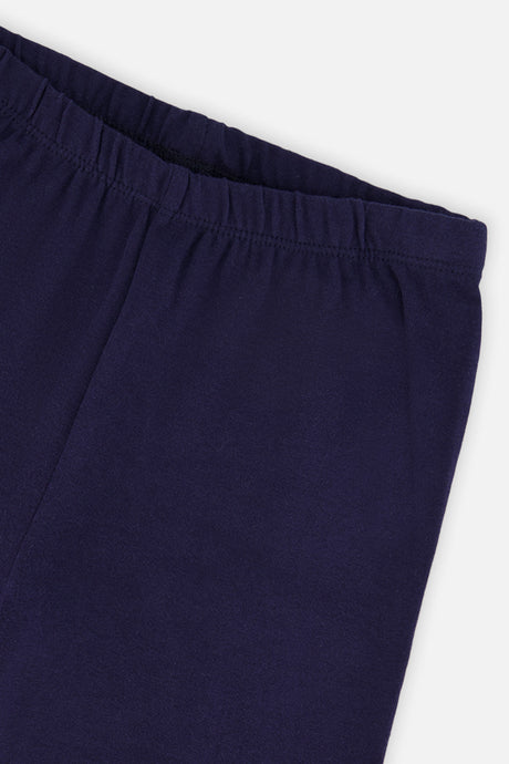 Close-up of the elastic waistband on dark blue leggings