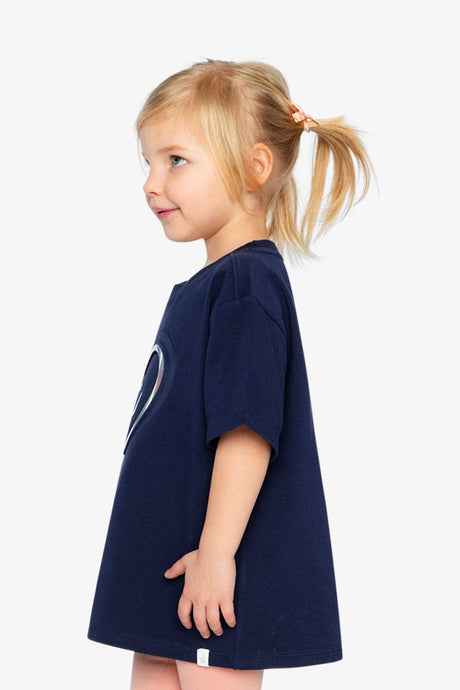 Deux par Deux girls' dark blue jersey T-shirt with holographic heart – on a child model, side view