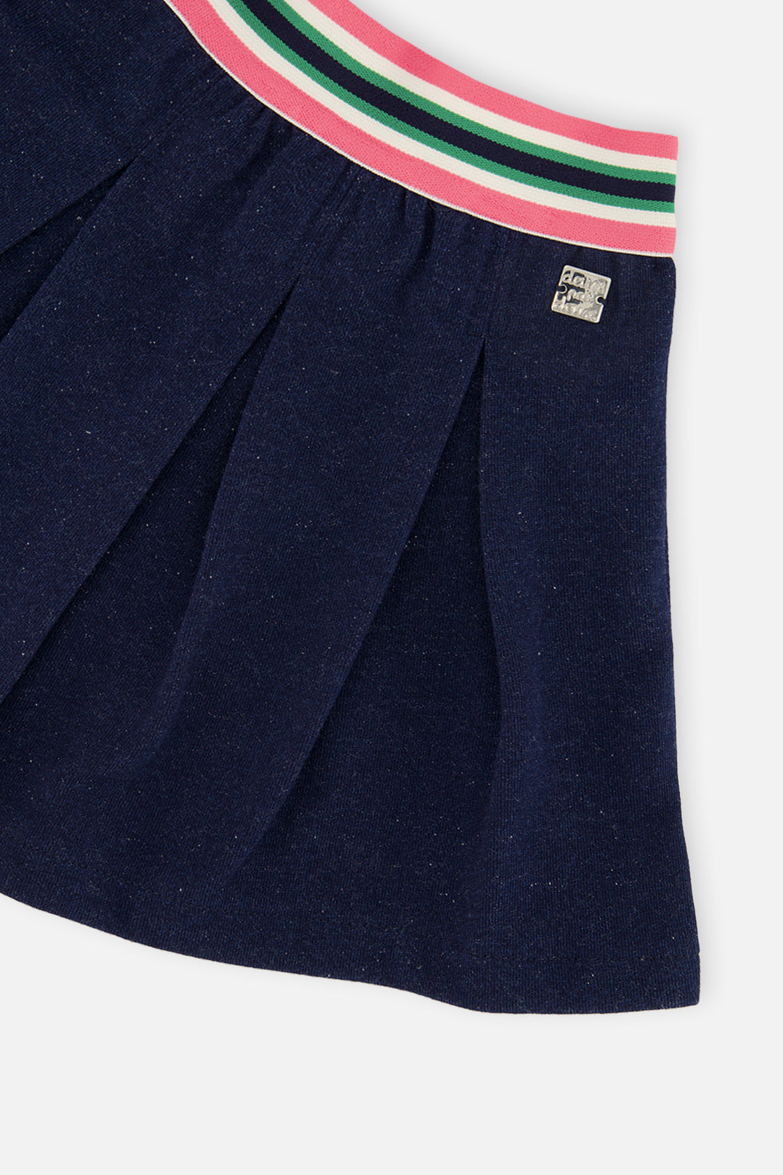 Close-up of the Pleated French Terry Skirt Navy Blue Denim striped elastic waistband and pleats