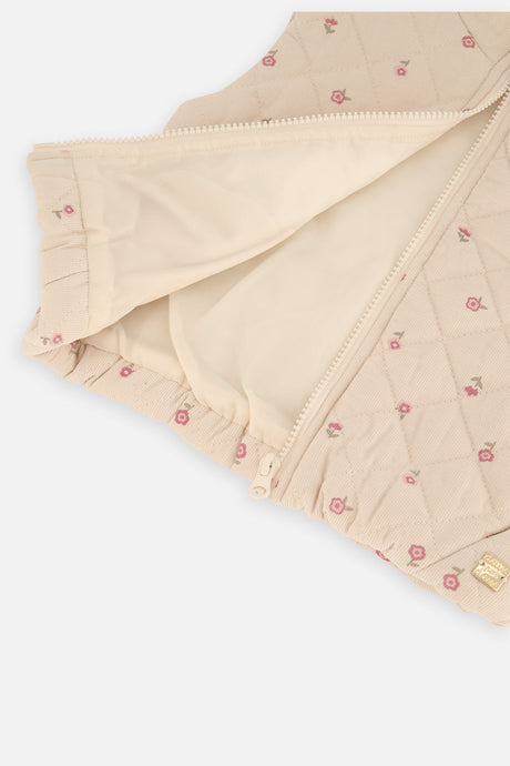 Inside view of the cream quilted Deux par Deux vest with the zipper open