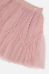 Close-up of the pink mesh tiers and elastic waistband