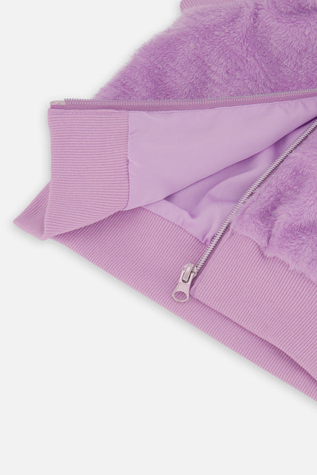 Open zipper on the violet faux fur vest showing the lining and ribbed hem, flat close-up