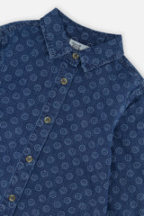 Close-up of the collar, buttons and small smiley faces on the blue chambray