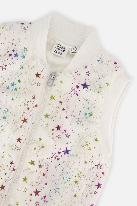 Close-up of the multicolored star print on the Deux par Deux faux fur vest