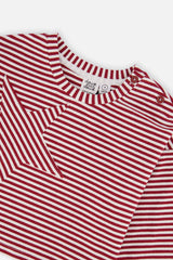 Close-up of the star appliqué and striped crew neckline