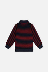 Back view of the red and blue striped top laid flat with navy cuffs and hem