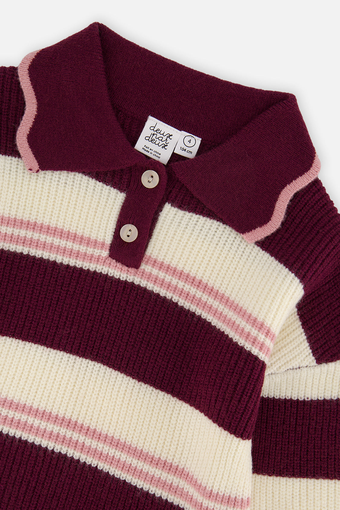 Close-up of the two-button polo collar with pink scalloped edge on the plum and cream Deux par Deux sweater