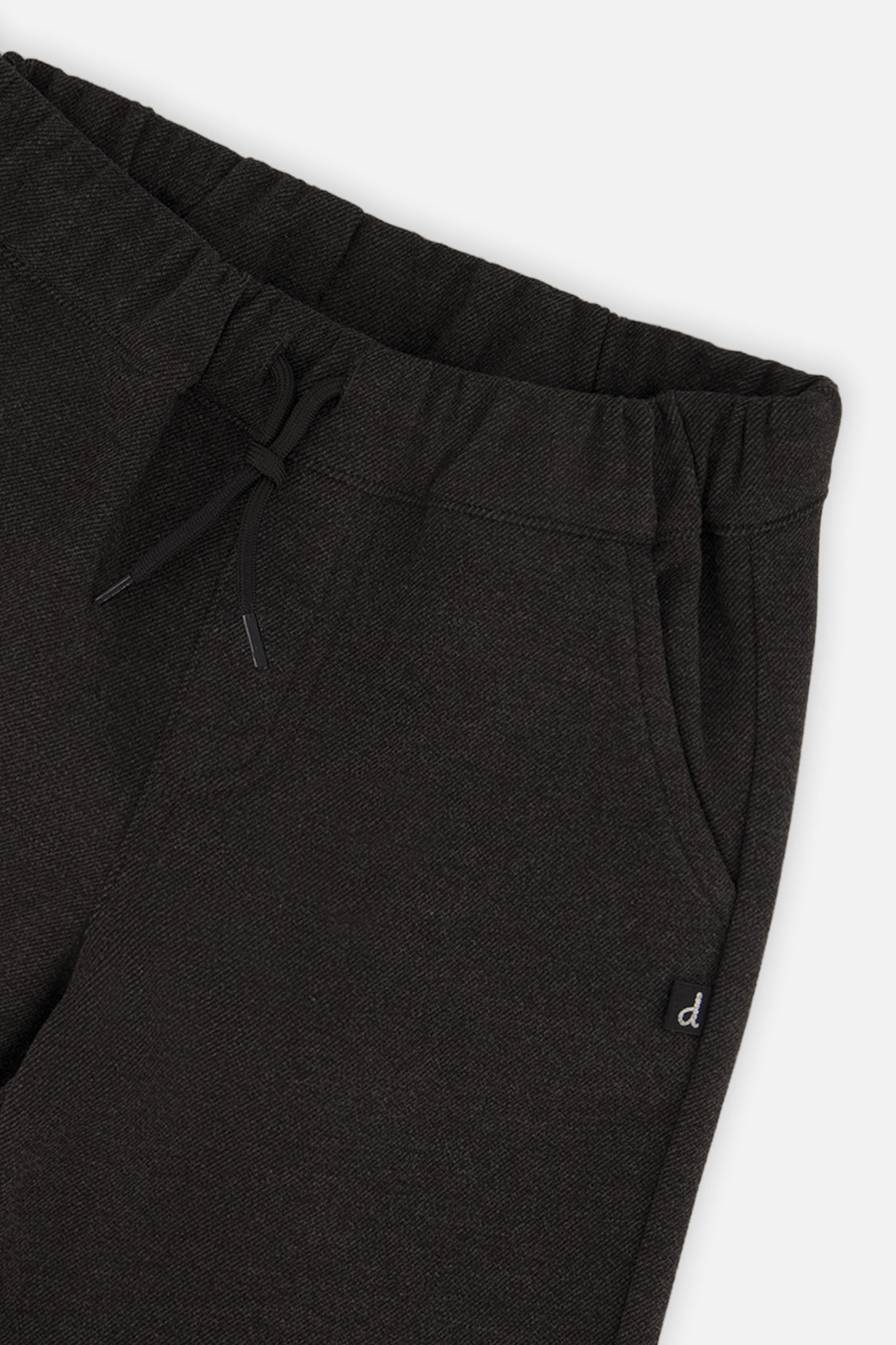 Close-up detail of the Deux par Deux black stretch twill dress pants
