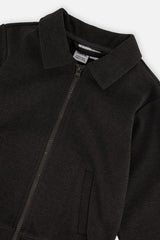 Close-up of the collar and angled front zipper on the black front zip jacket