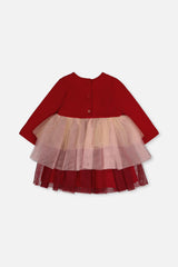Back view of the Deux par Deux red dress with glittering skirt