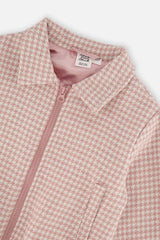 Close-up of the collar, pink zipper and pink lining on the houndstooth bomber