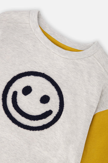 Close-up of the textured navy smiley face and ribbed neckline on the heather gray Deux par Deux sweatshirt