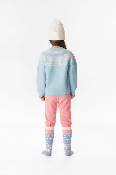 Child wearing the light blue Fair Isle knit sweater, back view with the patterned yoke