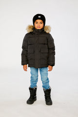 Child wearing the Deux par Deux black winter jacket with faux-fur hood, view 1