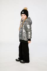 Child wearing the Deux par Deux dark metallic glitter puffy winter jacket, side view