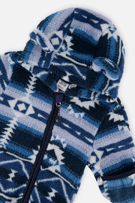 Close-up of the Aztec blue plush hood ears, zipper and fold-over mitten cuff