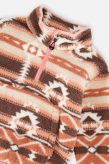 Close-up of the high collar and pink half-zip on the aztec pink plush pullover jacket