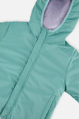 Close-up of the coated fabric side of the Deux par Deux reversible jacket
