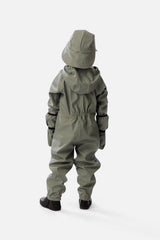 Back view of a child wearing the sage green rain one-piece with mittens and a rain hat