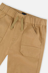 Deux par Deux baby boy stretch canvas jogger pants in beige, view 3