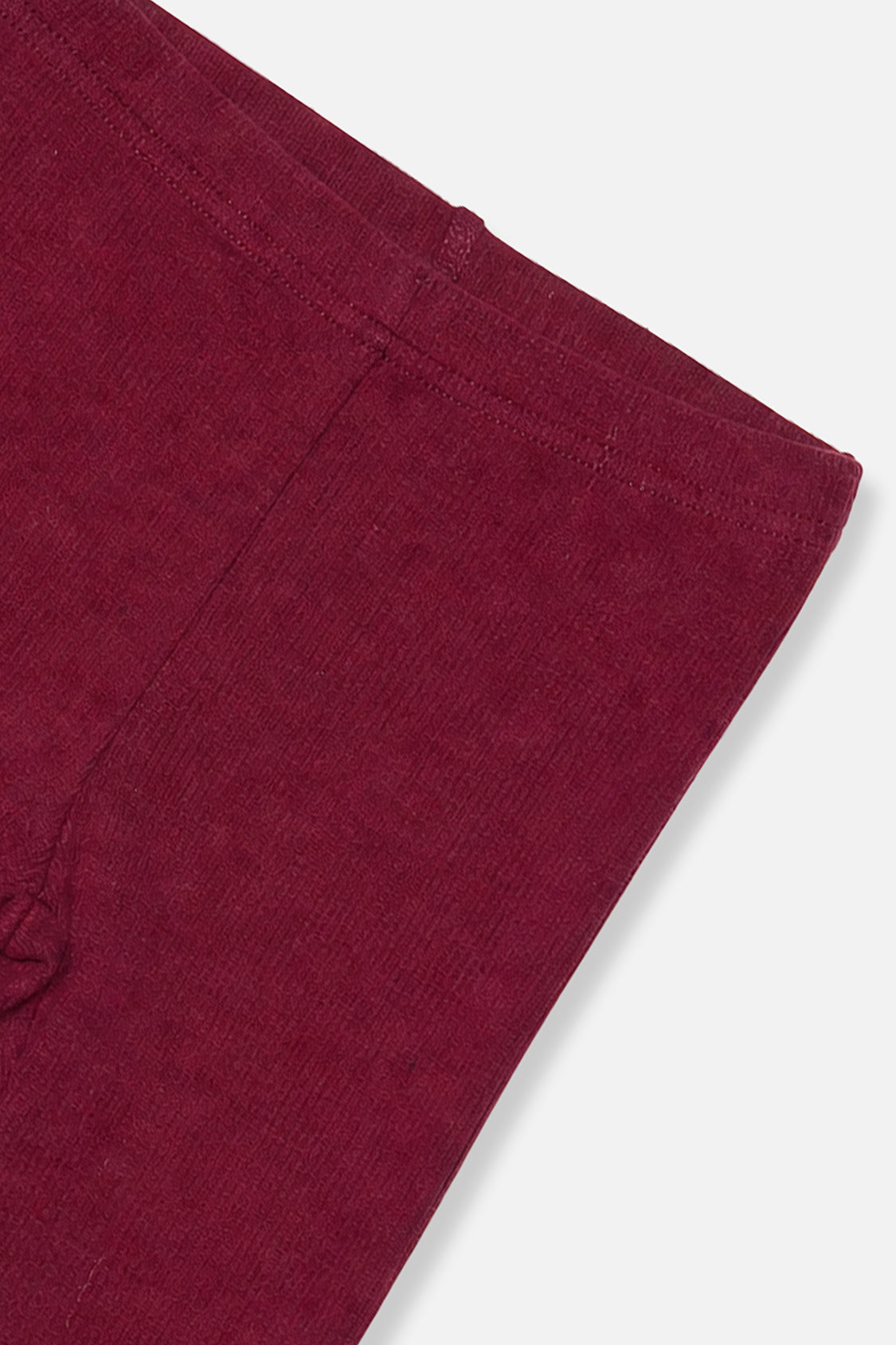 Close-up of the ribbed fabric and waistband on the Deux par Deux burgundy leggings