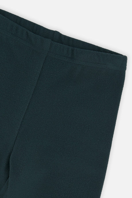 Close-up of the rib texture and waistband on jasper green leggings
