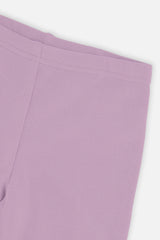 Close-up of the rib texture and waistband on violet leggings