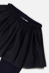 Close-up of the gathered waistband and dotted tulle on the Deux par Deux navy leggings