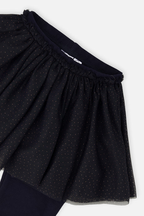 Close-up of the gathered waistband and dotted tulle on the Deux par Deux navy leggings