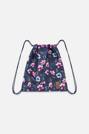 Deux par Deux drawstring bag in a navy floral print with pink and blue flowers and navy and white cord straps