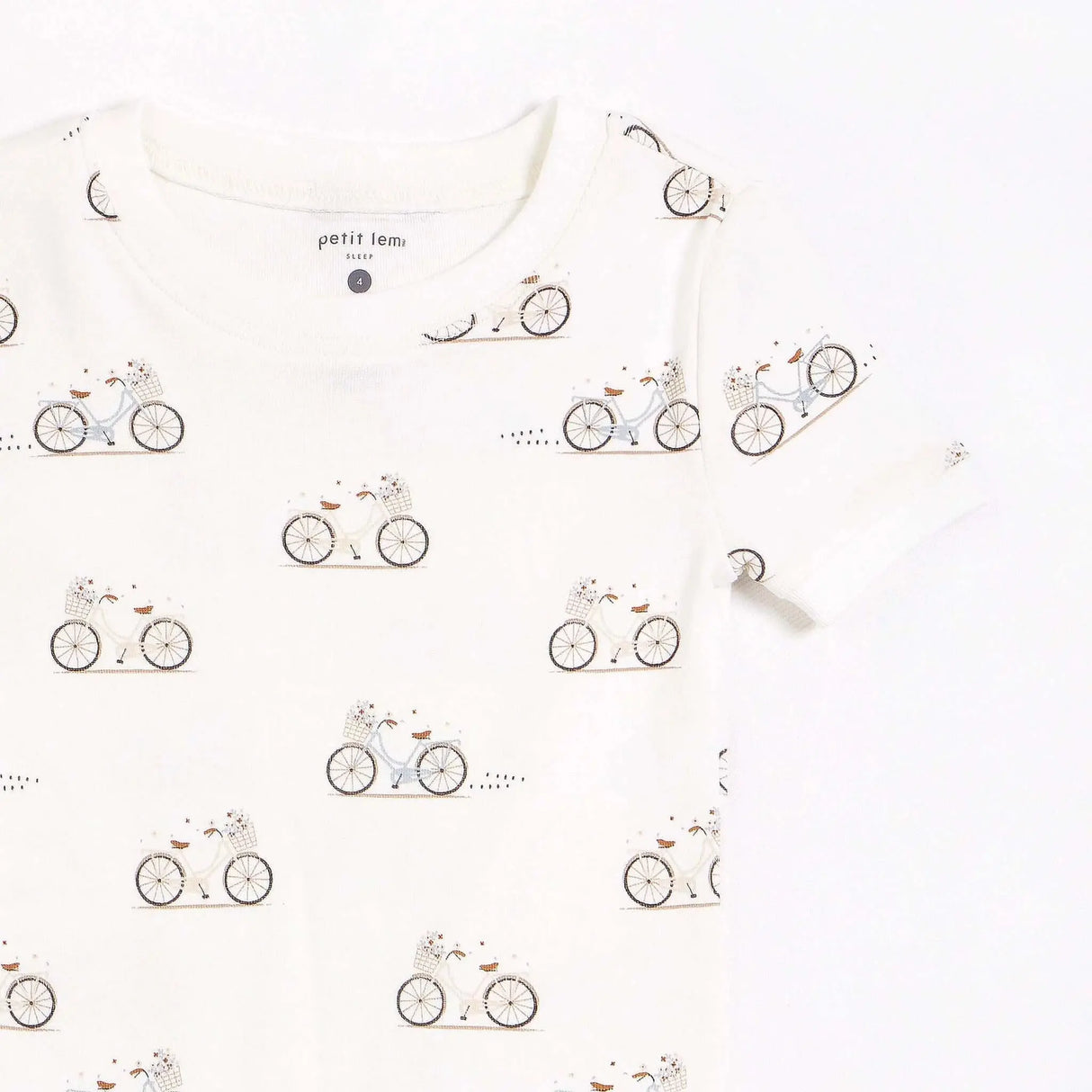 "la bicyclette" print on off-white infant pajama set | petit lem