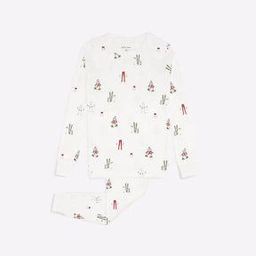 Petit Lem girls Skiing Penguins organic cotton pajama set in Off-White with long sleeves and matching pants.