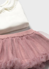 Close-up snap crotch on bodysuit for quick changes