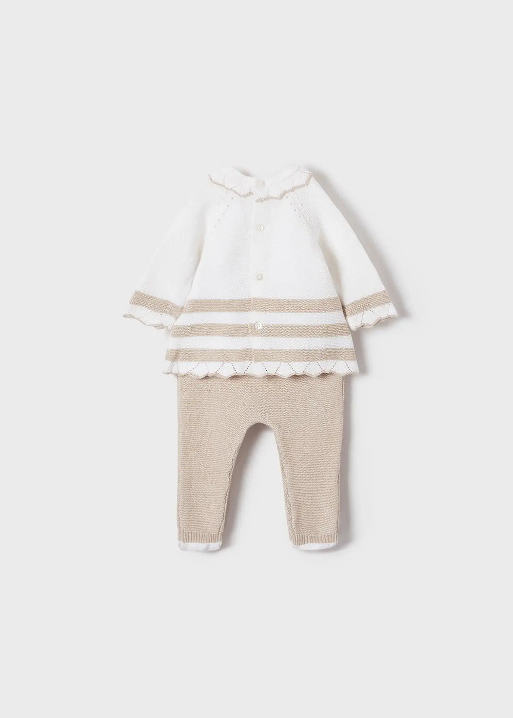 Full view of two-piece knit set with striped leggings and shoulder-button jumper.