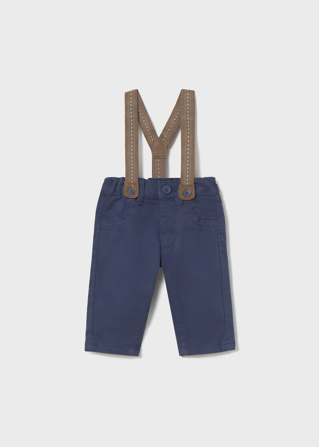 Front flat lay of newborn navy baby pants with Tan detachable suspenders.