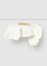 Ivory baby girl outfit set with cardigan, bodysuit, and skirt on hanger